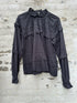 Skall studio bluse sort væg