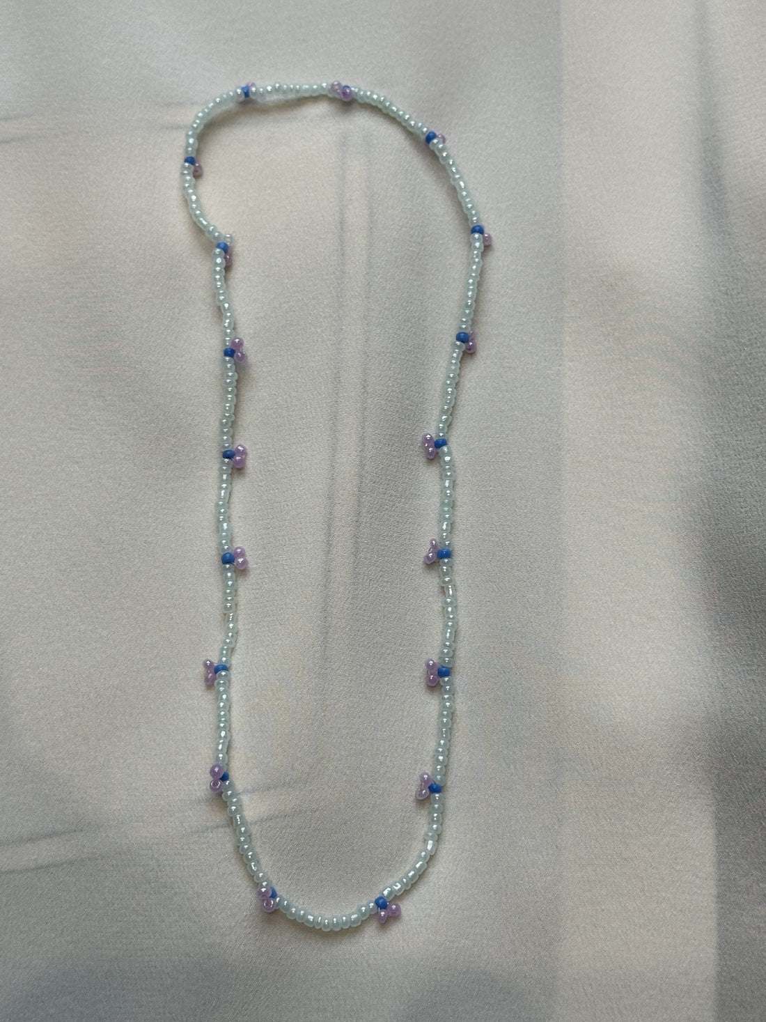 Pearl Necklace in gray with purple berries
