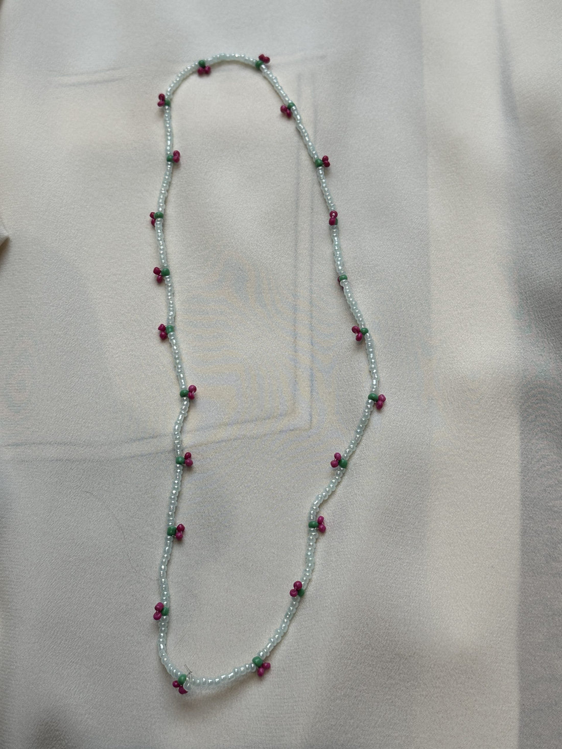 Pearl Necklace in gray with pink berries